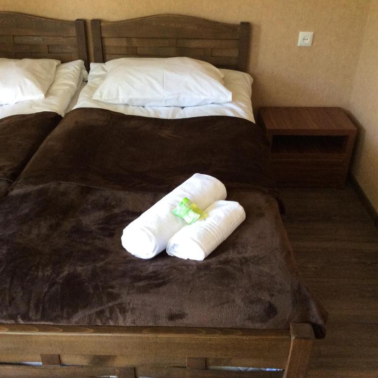 Postel nebo postele na pokoji v ubytování Guest House Chuta in Lagami