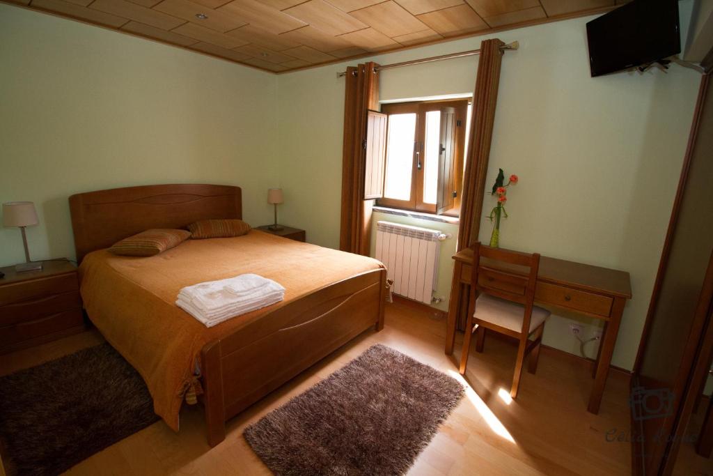 Postel nebo postele na pokoji v ubytování Casa do Telheiro