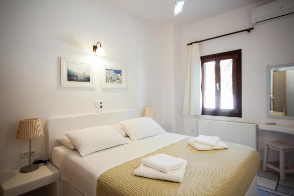 Postel nebo postele na pokoji v ubytování La Noi Houses