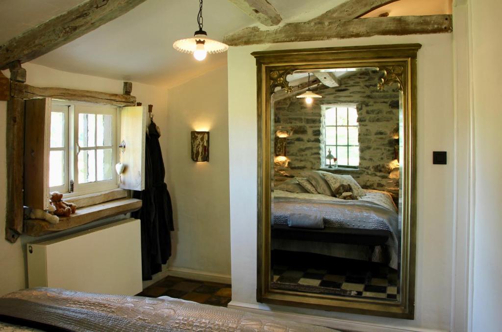 Postel nebo postele na pokoji v ubytování B&B Het Stille Genoegen