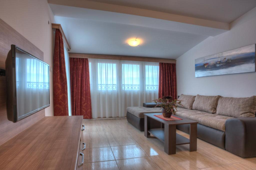 Posezení v ubytování Guest House Maslina