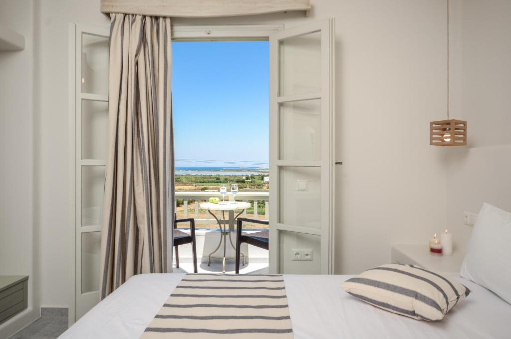 Postel nebo postele na pokoji v ubytování Agnadi Hotel
