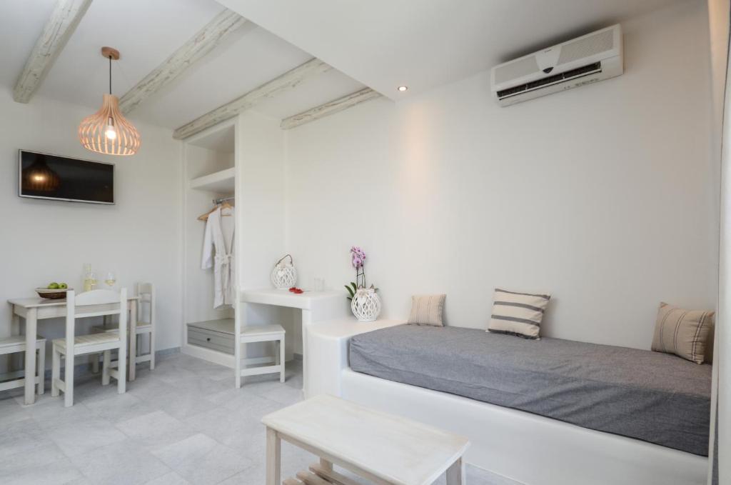 Postel nebo postele na pokoji v ubytování Agnadi Hotel