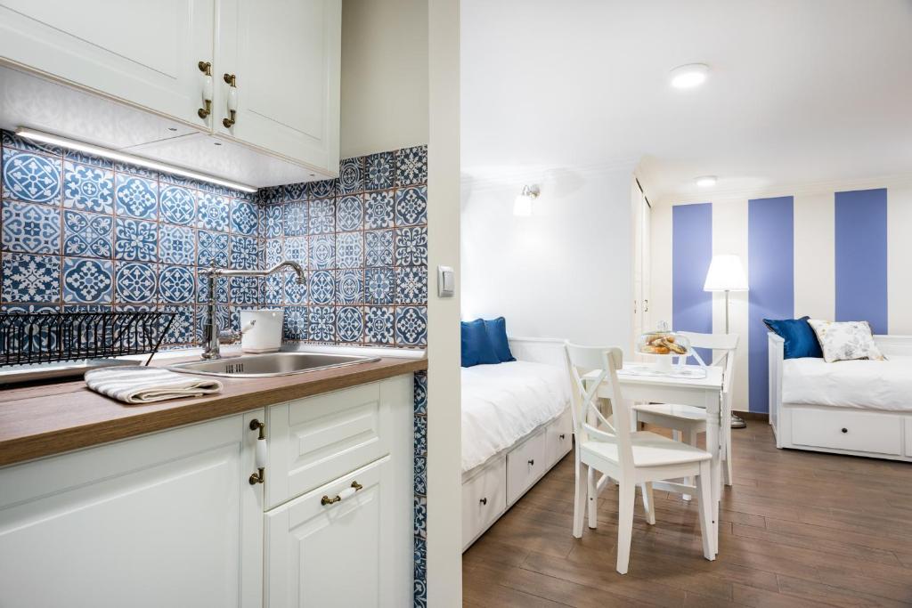 Posedenie v ubytovaní P&J Luxury Apartments