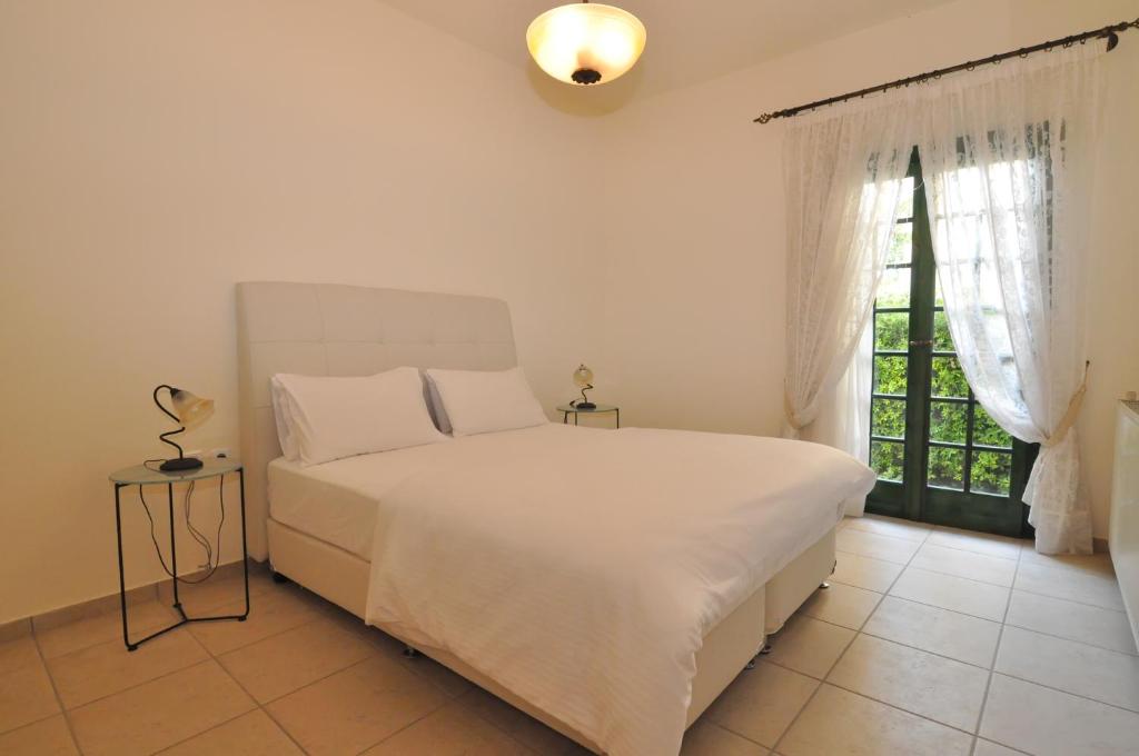 Posteľ alebo postele v izbe v ubytovaní Ocean Village Apartments