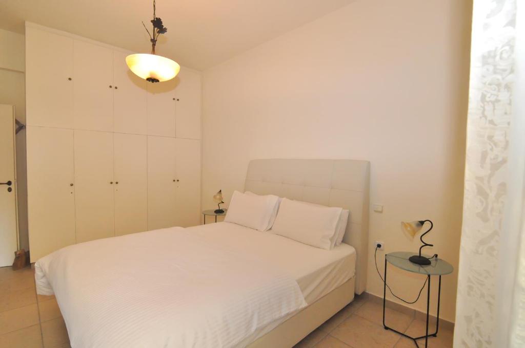 Posteľ alebo postele v izbe v ubytovaní Ocean Village Apartments