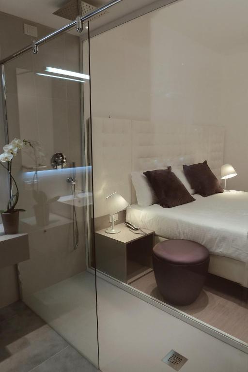 Posteľ alebo postele v izbe v ubytovaní Hotel Lugano Torretta