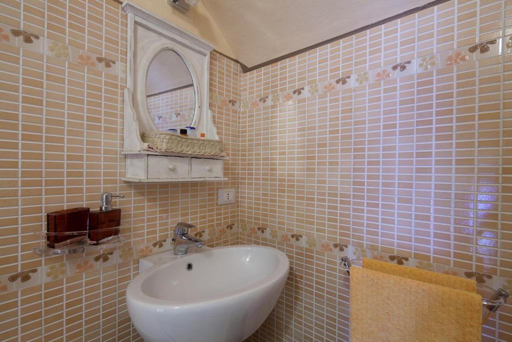 Koupelna v ubytování B&B La Pulce Dorata