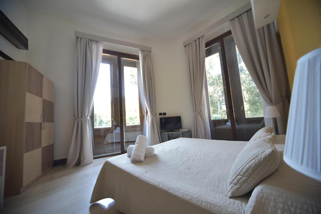 Postel nebo postele na pokoji v ubytování B&B Del Duomo