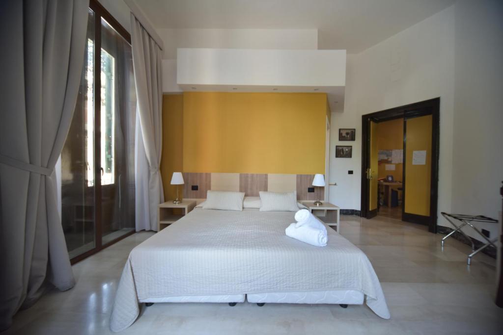 Postel nebo postele na pokoji v ubytování B&B Del Duomo