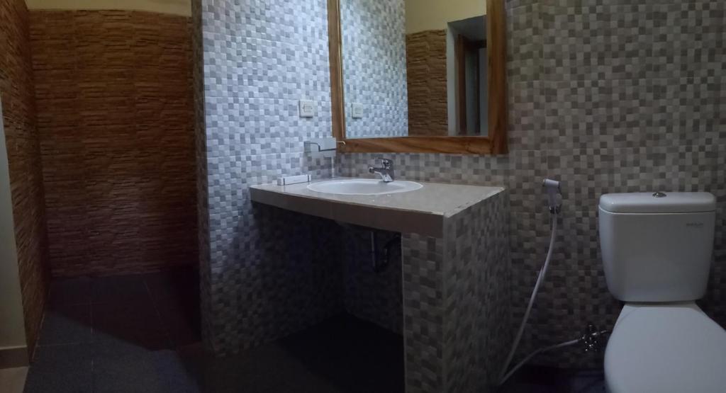 Koupelna v ubytování Villa Kinagu