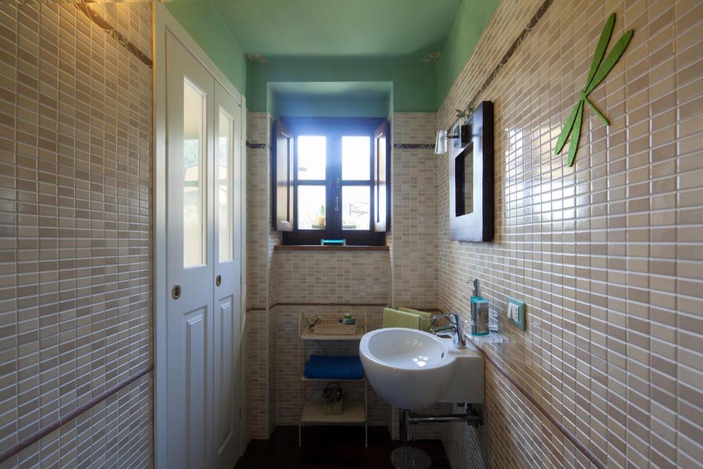 Koupelna v ubytování B&B La Pulce Dorata