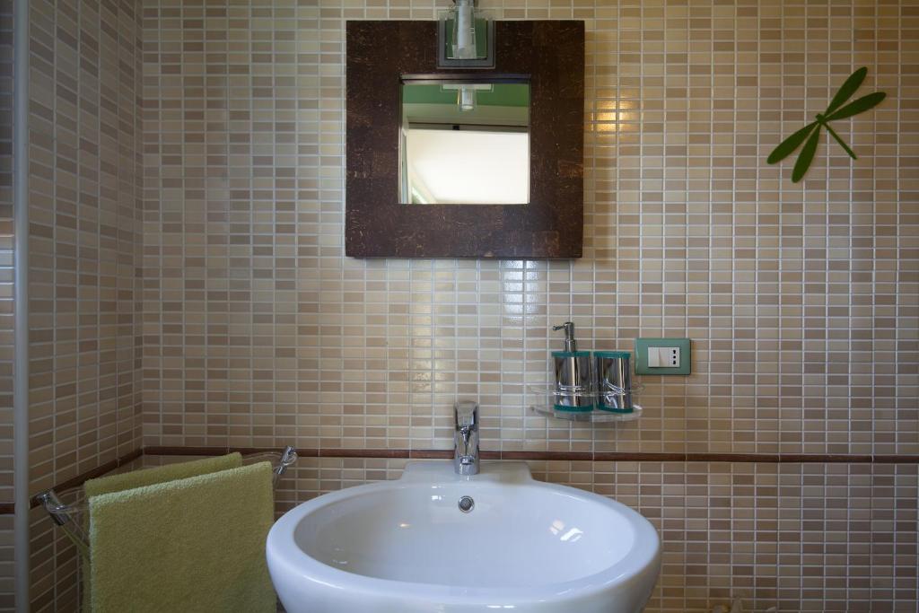 Koupelna v ubytování B&B La Pulce Dorata