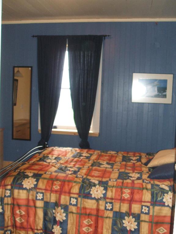 Postel nebo postele na pokoji v ubytování Gîte Au Coin De La Berge