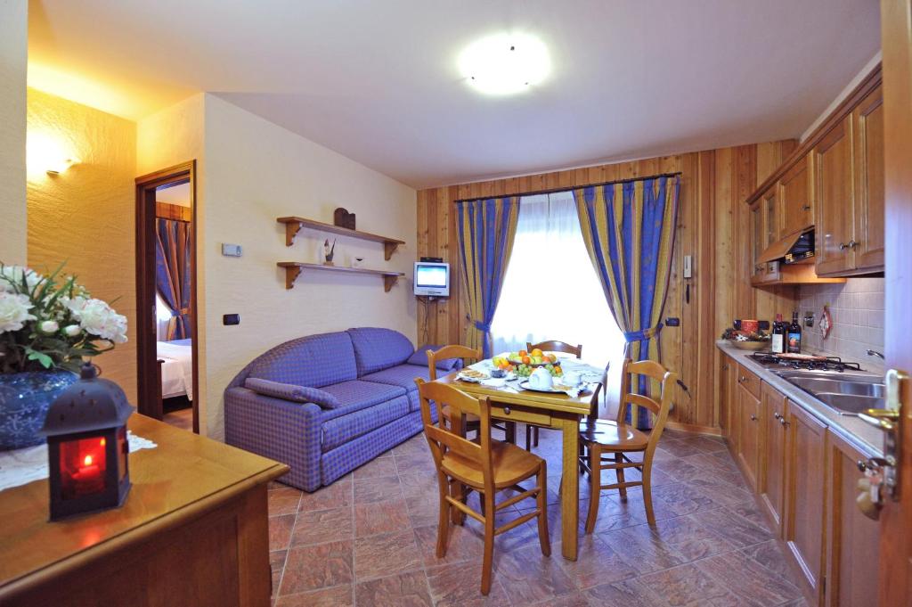 Kuchyň nebo kuchyňský kout v ubytování Family Apartments Le Chalet
