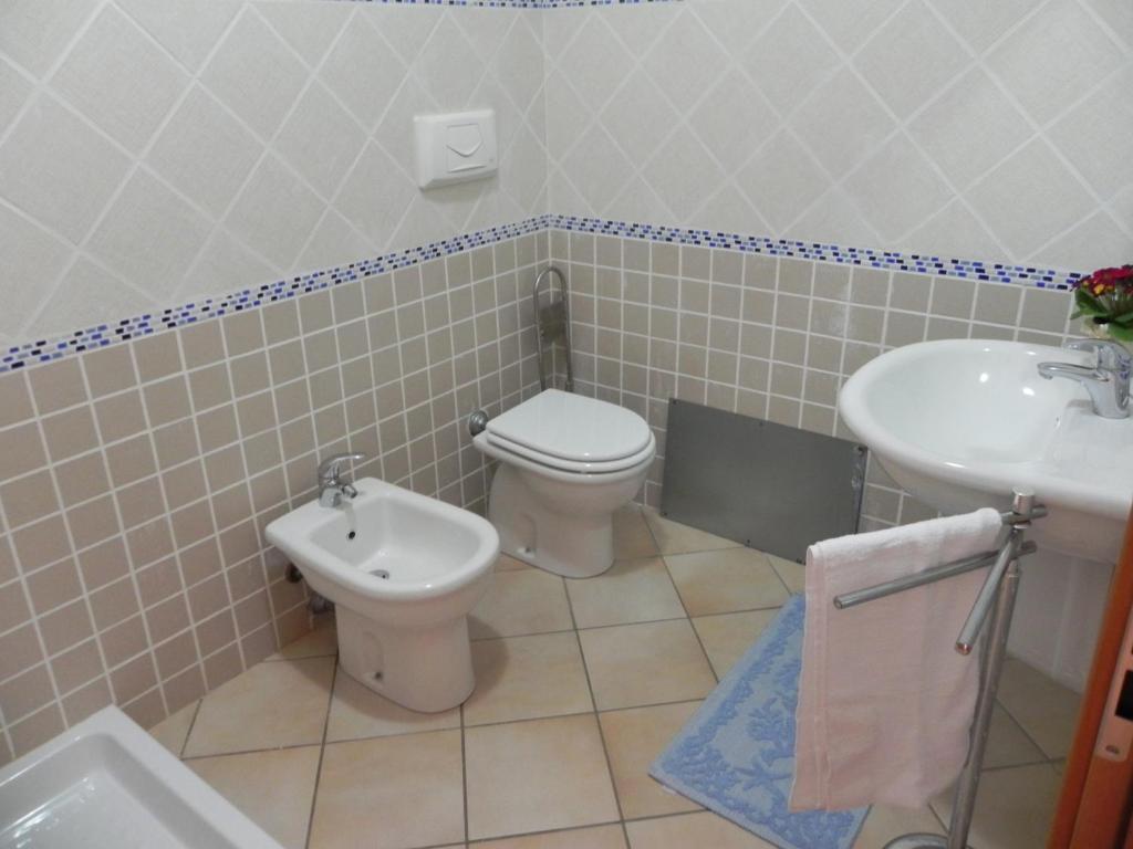Koupelna v ubytování Buggerru a Mare Residence