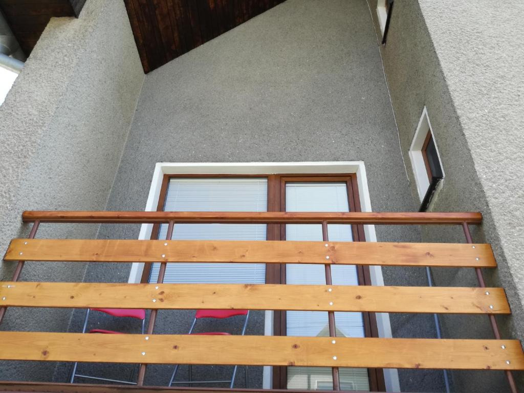 A balcony or terrace at Apartmány Lenko - near thermal aquapark Tatralandia