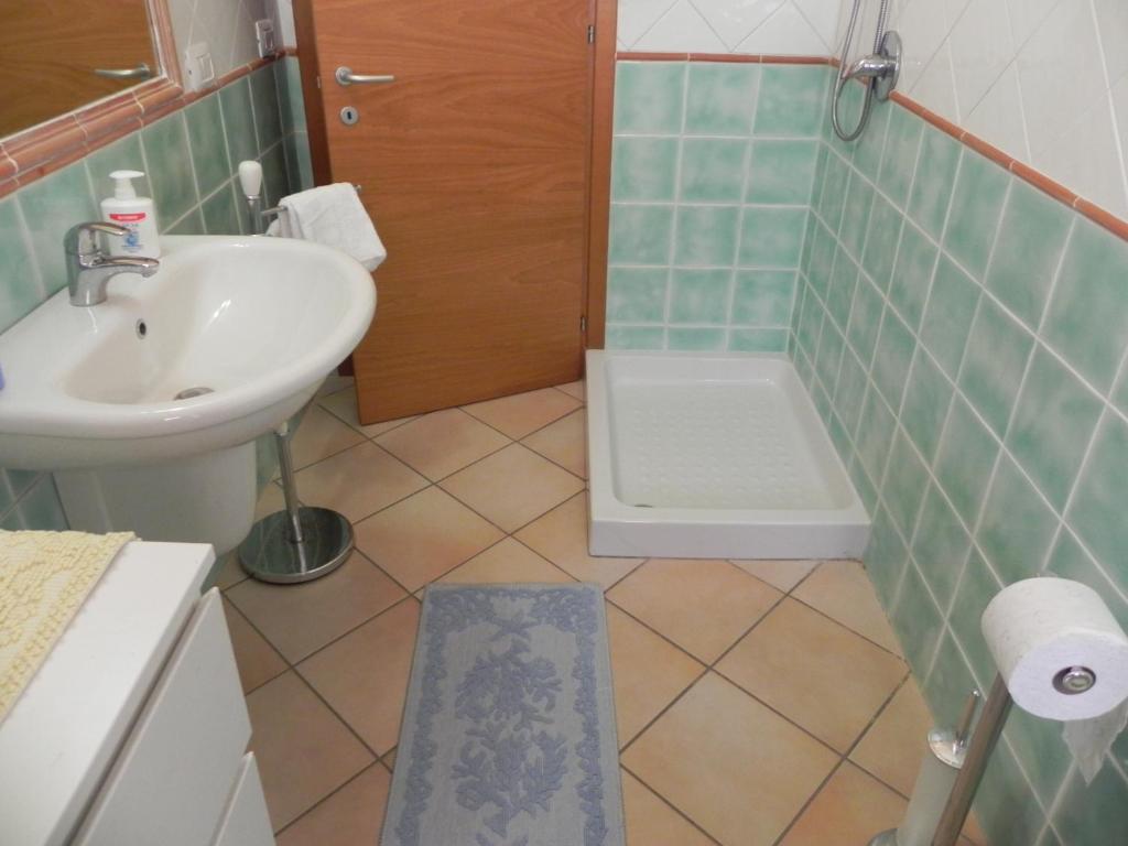 Koupelna v ubytování Buggerru a Mare Residence