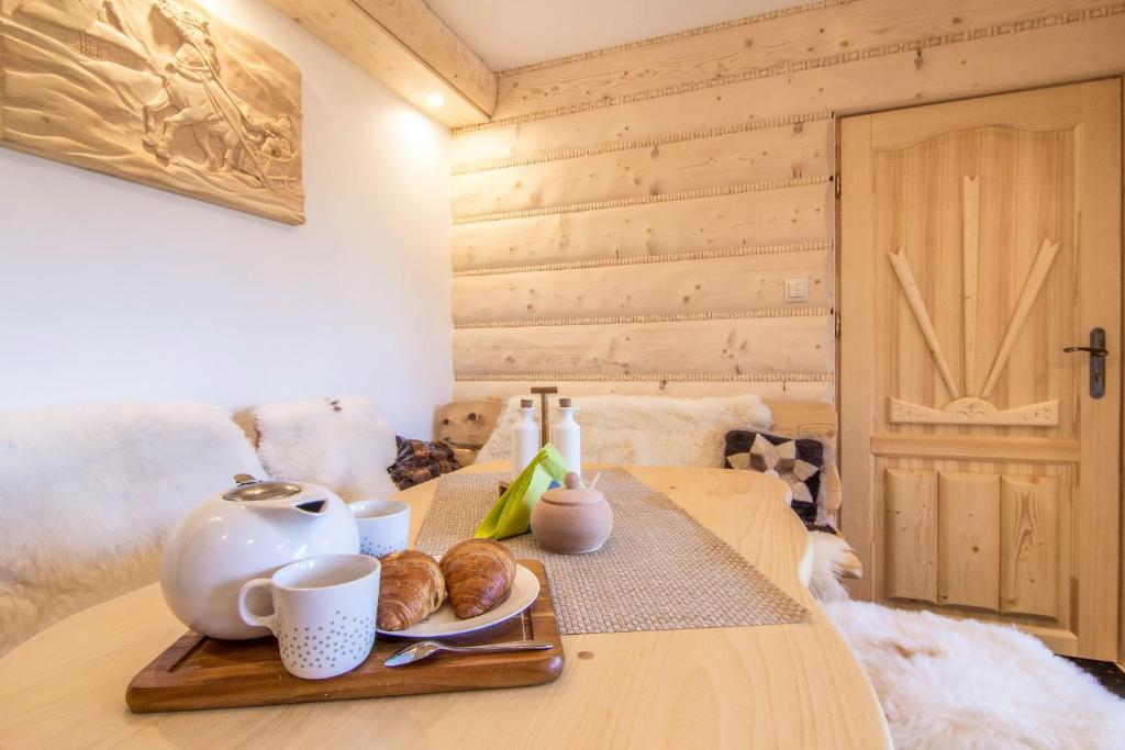Posteľ alebo postele v izbe v ubytovaní Apartamenty Kiry Zakopane