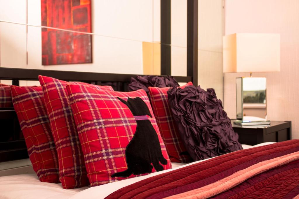 Postel nebo postele na pokoji v ubytování Haylie Hotel