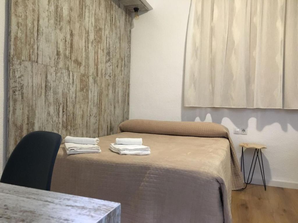 Postel nebo postele na pokoji v ubytování RoomConcept Hostel