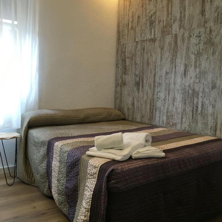 Postel nebo postele na pokoji v ubytování RoomConcept Hostel