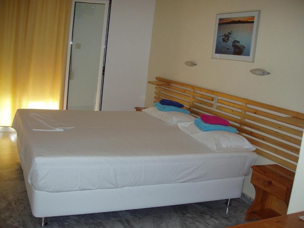 Postel nebo postele na pokoji v ubytování Villa Kavourakia