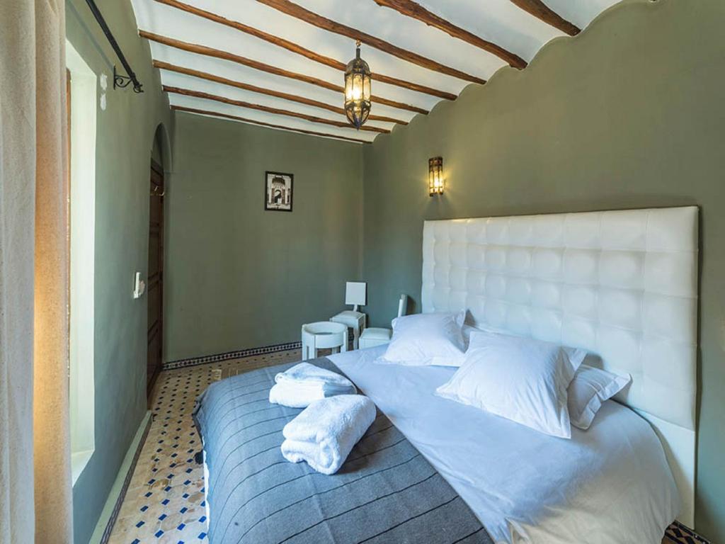 Postel nebo postele na pokoji v ubytování Riad Chams Marrakech