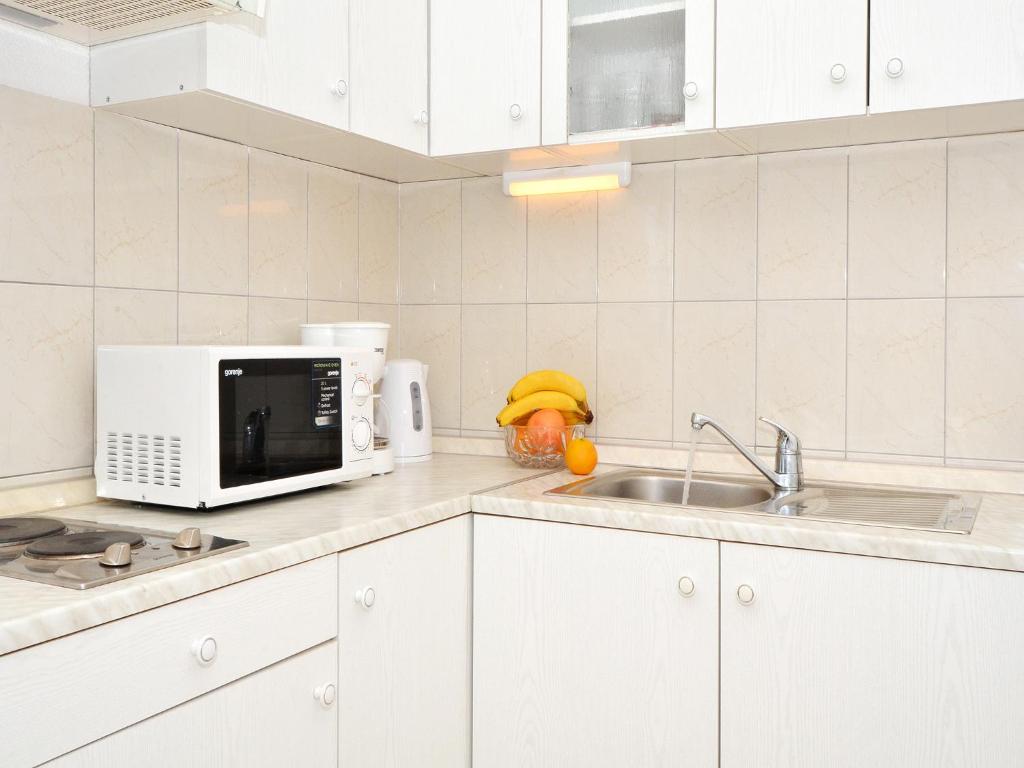 Kuchyňa alebo kuchynka v ubytovaní Apartments Zarkovic
