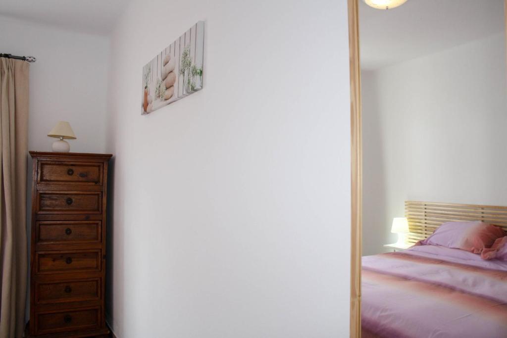 Postel nebo postele na pokoji v ubytování VILLA MANUELA by Buenavilla