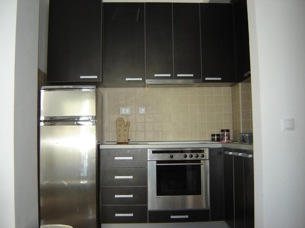 Kuchyň nebo kuchyňský kout v ubytování Apartments Beljić