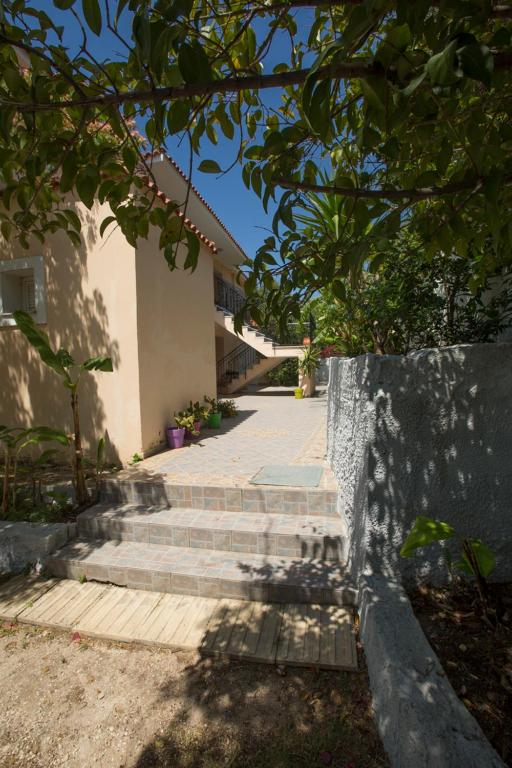 a set of stairs leading up to a building at Summer Dream in Vlachata