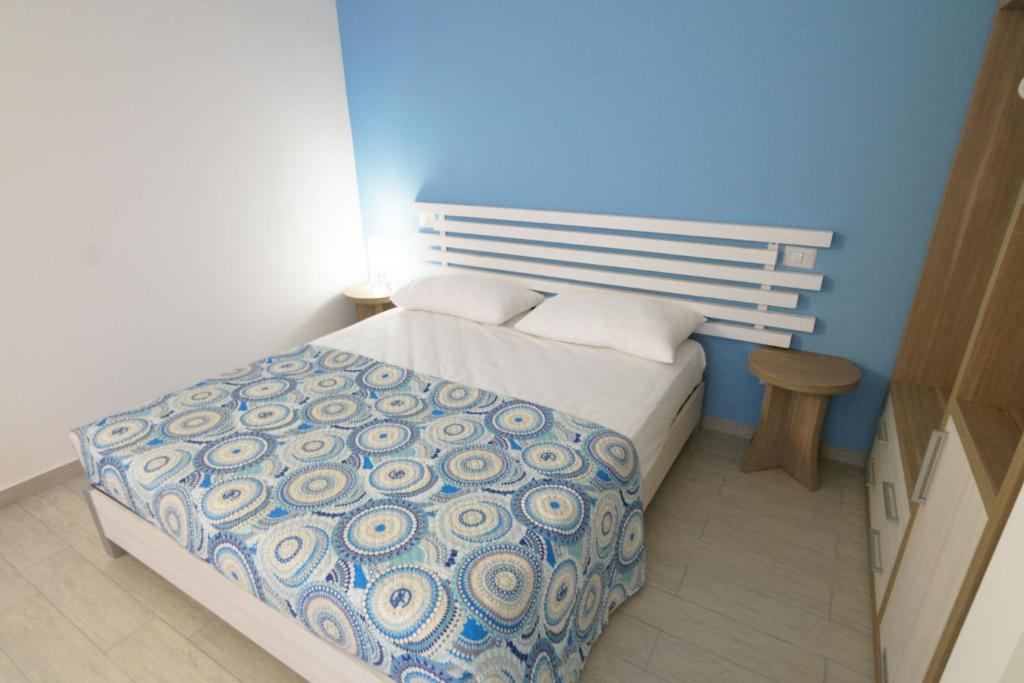 Łóżko lub łóżka w pokoju w obiekcie Casa Dante Bed&Breakfast