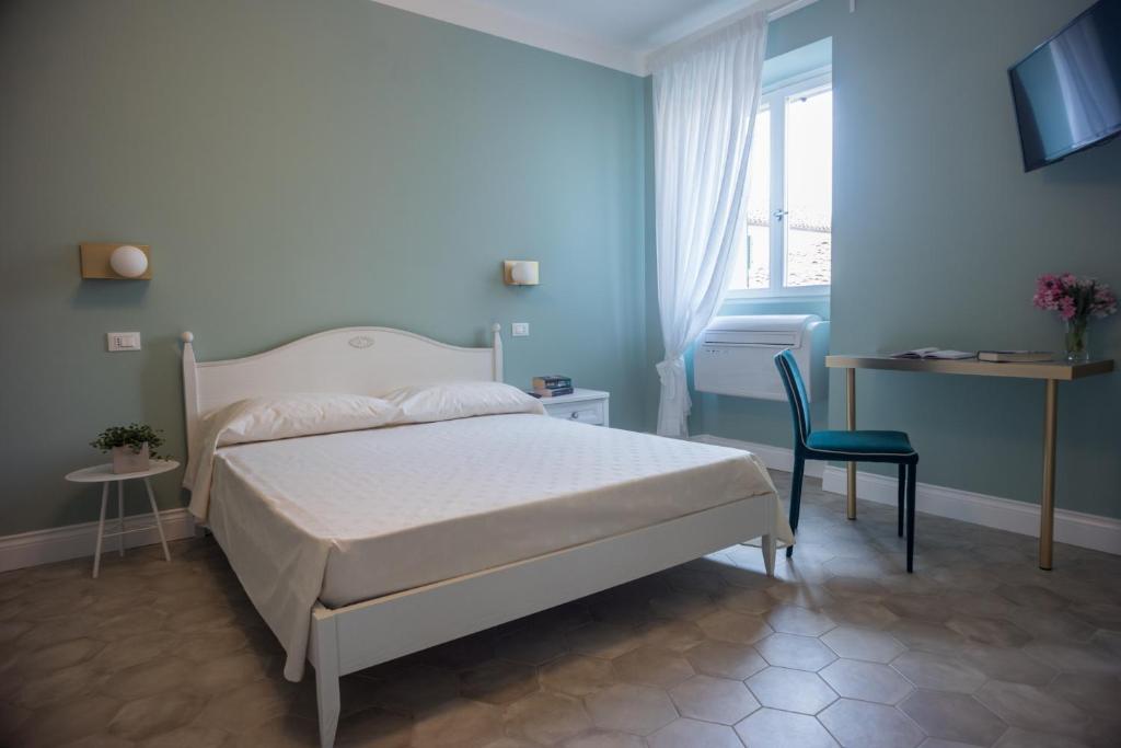 Postel nebo postele na pokoji v ubytování AleMar Sirolo