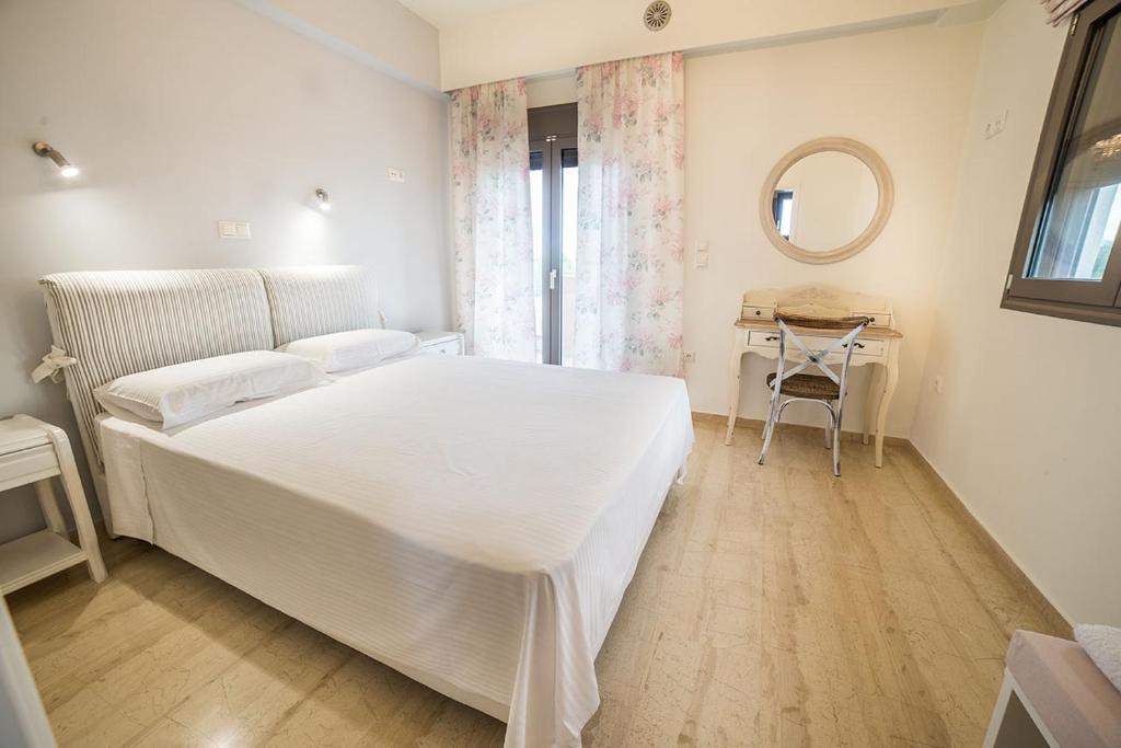 Postel nebo postele na pokoji v ubytování Lena Mare