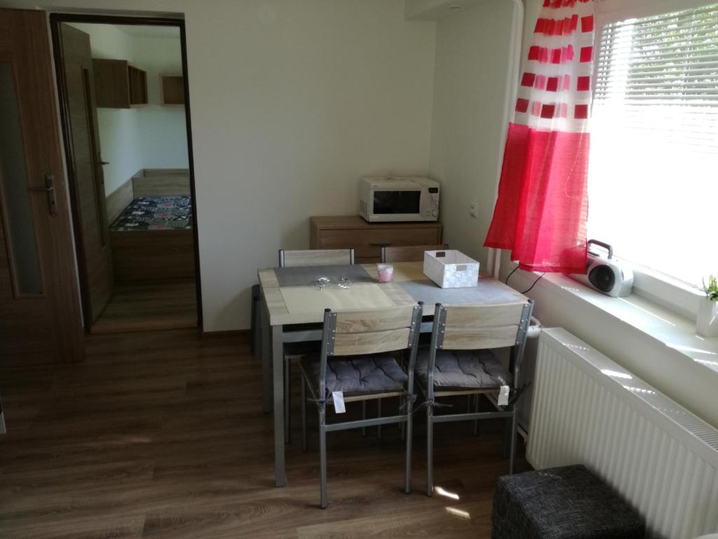 A bed or beds in a room at Apartmány Lenko - near thermal aquapark Tatralandia