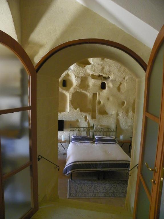 Postel nebo postele na pokoji v ubytování Locus Amoenus