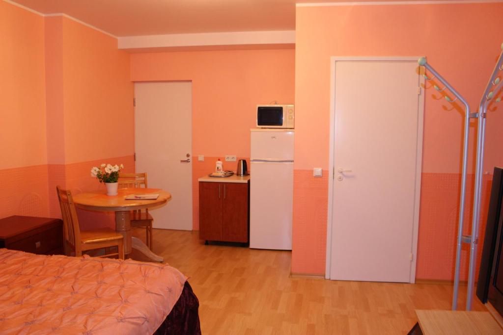 TV a/nebo společenská místnost v ubytování Fortuna Apartments