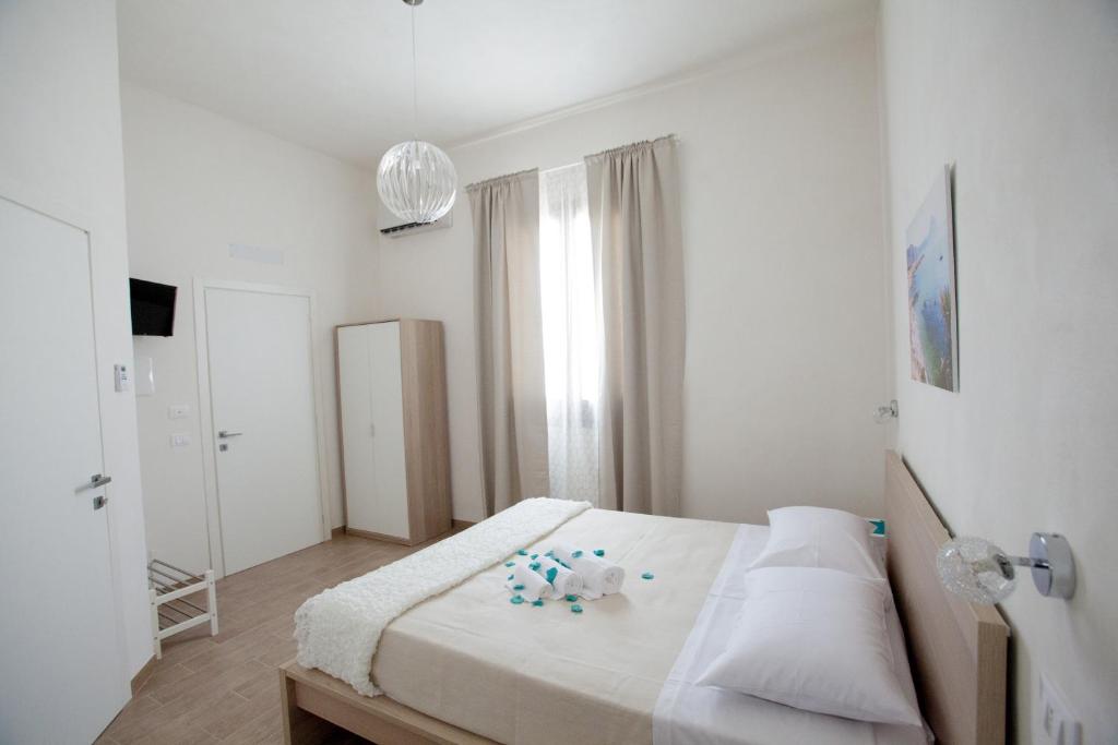 Postel nebo postele na pokoji v ubytování B&B La mia Isola
