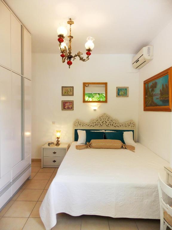 Postel nebo postele na pokoji v ubytování Skiathos Driades