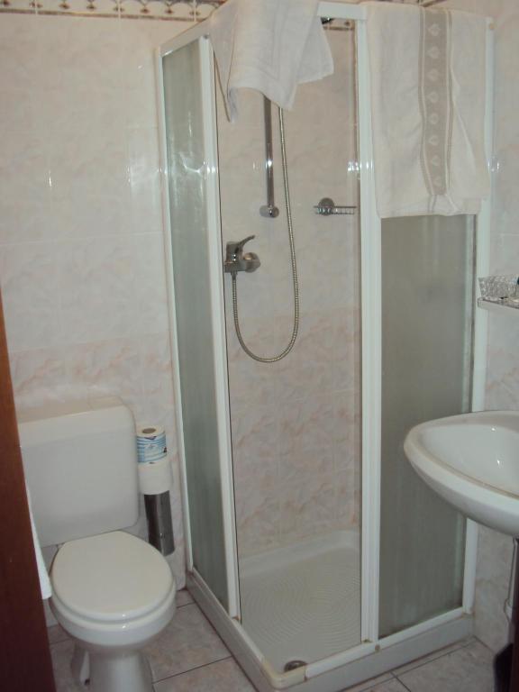 Koupelna v ubytování Hotel Cavaria