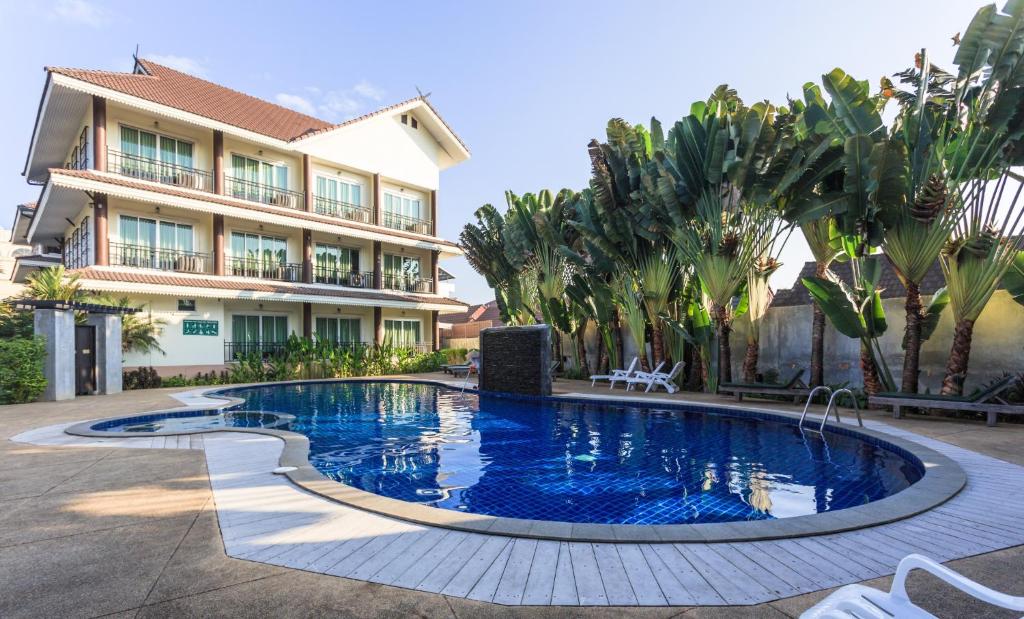 Bazén v ubytování Diamond Park Inn Chiangrai & Resort nebo v jeho okolí