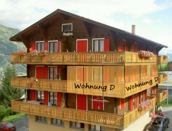 budynek z napisem "Wolfgangonding" w obiekcie Apartment Regina w mieście Grächen