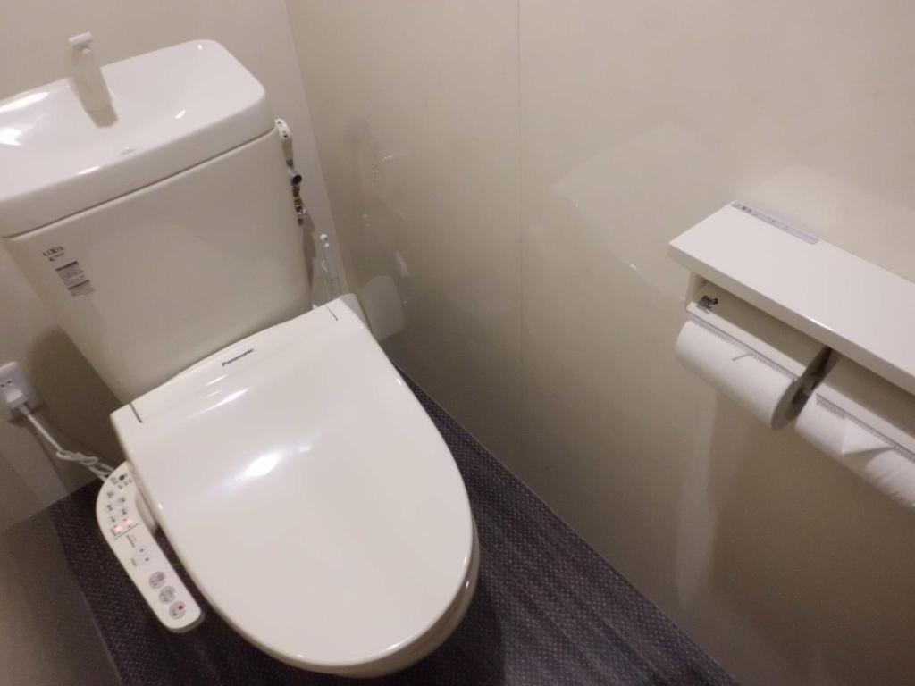 Koupelna v ubytování Sumiya Spa & Hotel