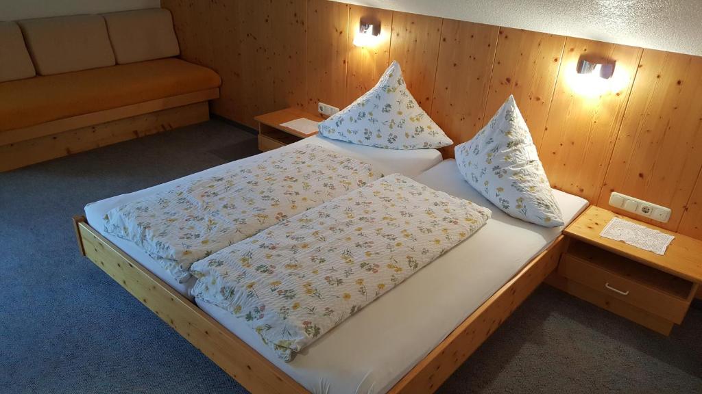 Postel nebo postele na pokoji v ubytování Haus Wilma