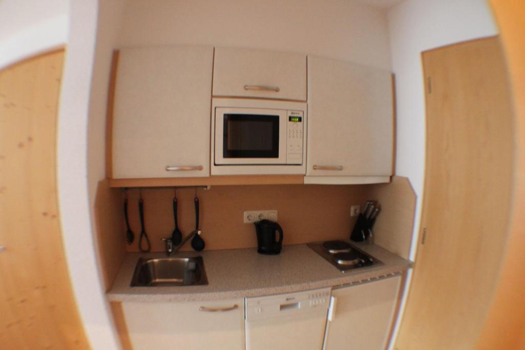 Kuchyň nebo kuchyňský kout v ubytování Haus Gerda