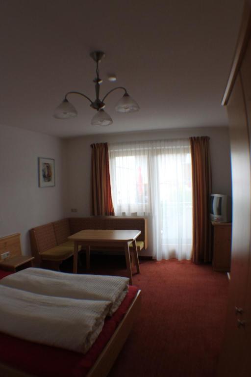 Postel nebo postele na pokoji v ubytování Haus Gerda