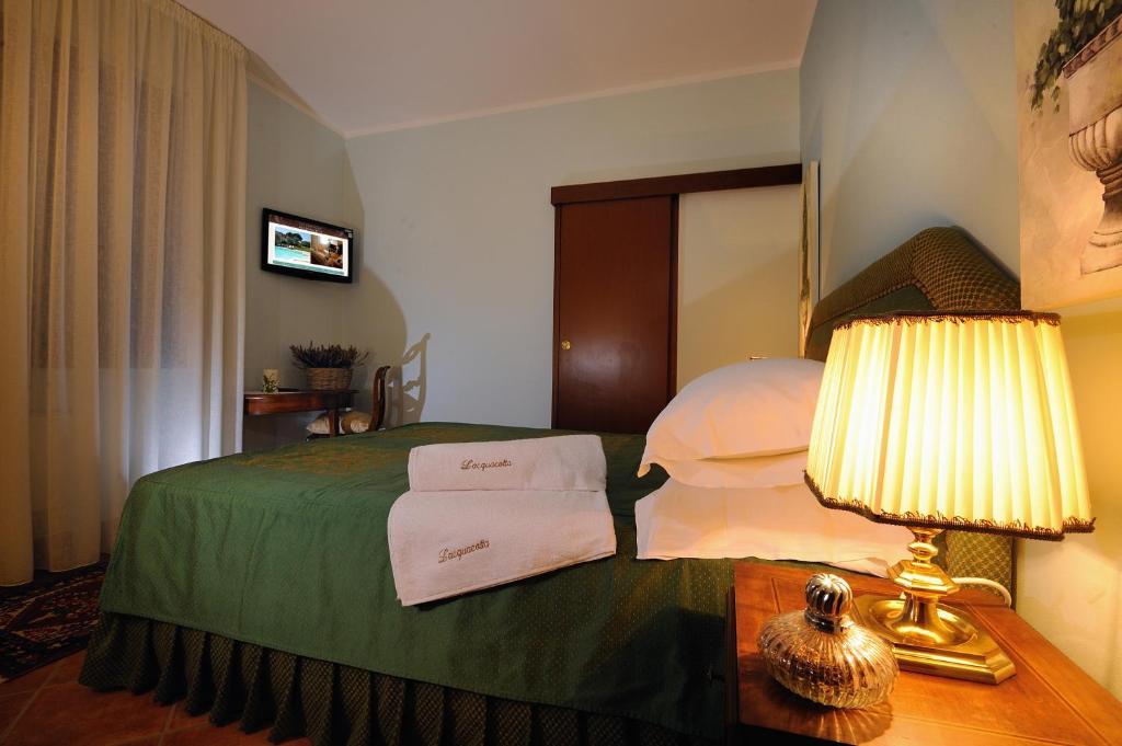 Posteľ alebo postele v izbe v ubytovaní Agriturismo - B&B L'Acquacotta