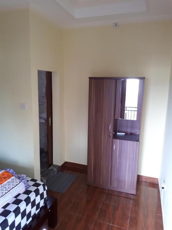 Postel nebo postele na pokoji v ubytování Indy House