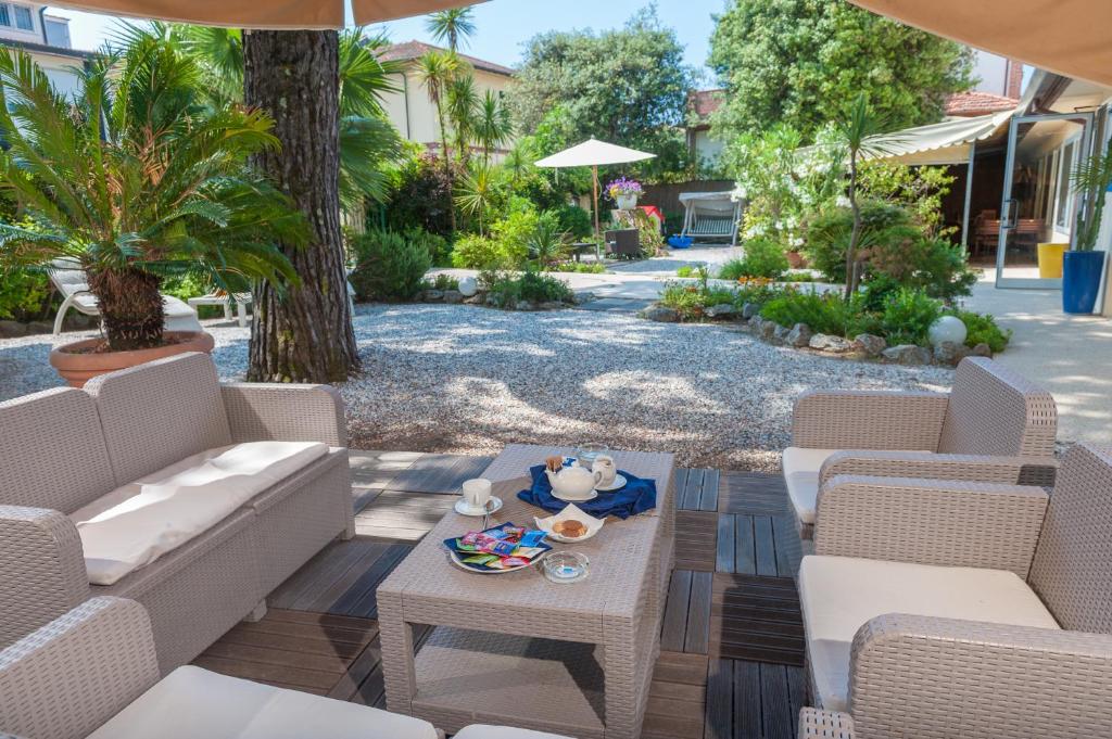 Posezení v ubytování Hotel La Pace